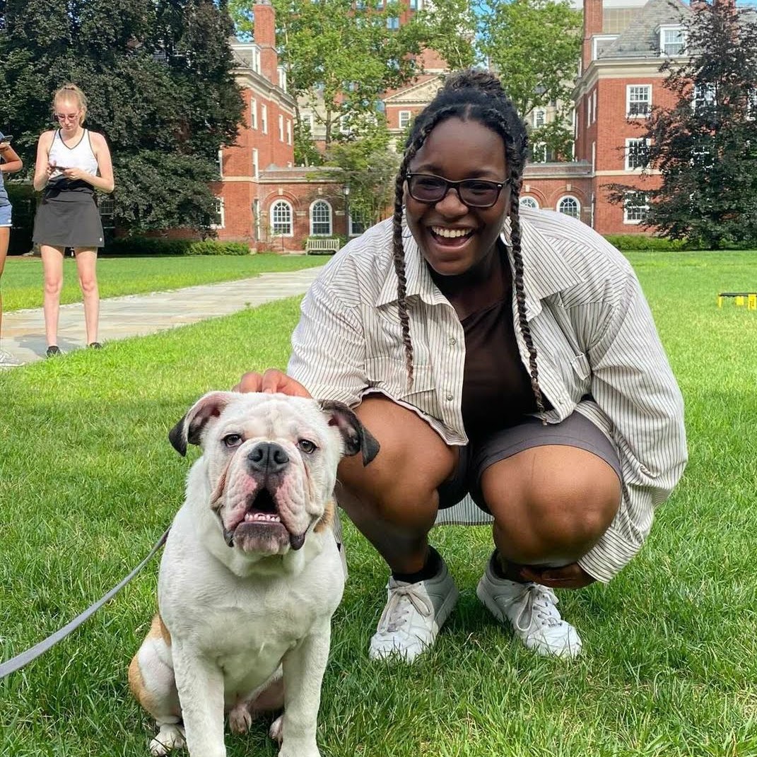 student with mascot bulldog